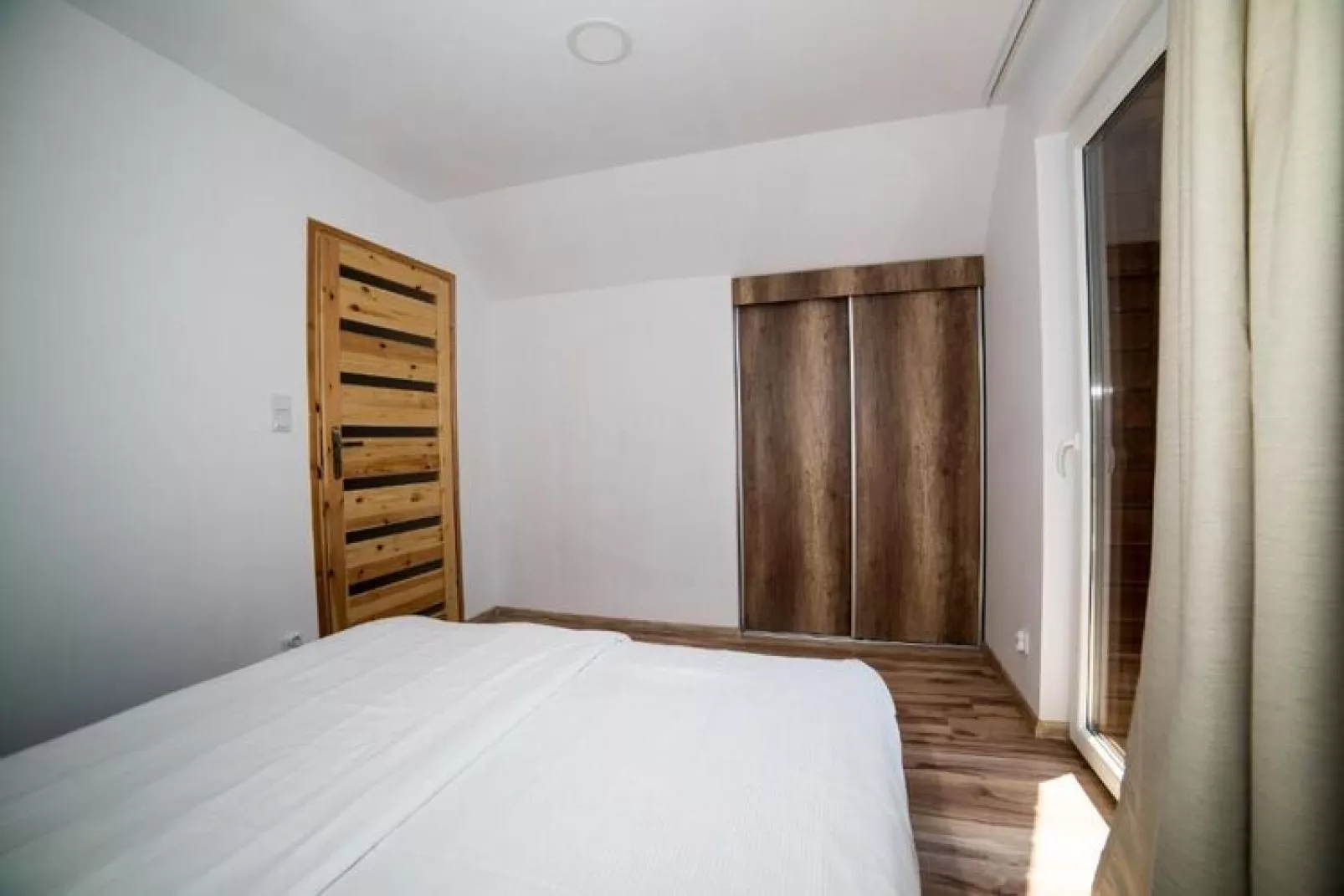 Domki STANDARD Jarosławiec-Slaapkamer