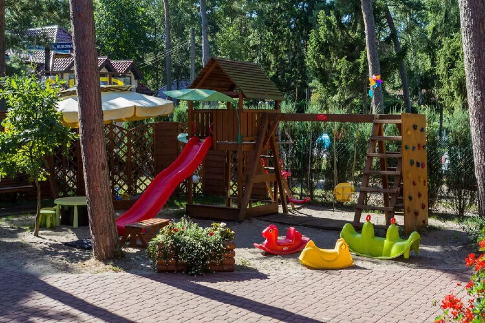 Domki letniskowe Pobierowo-Tuinen zomer