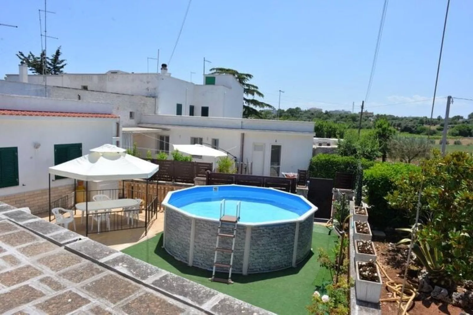 Trullo Cittadino Cisternino-Tuinen zomer