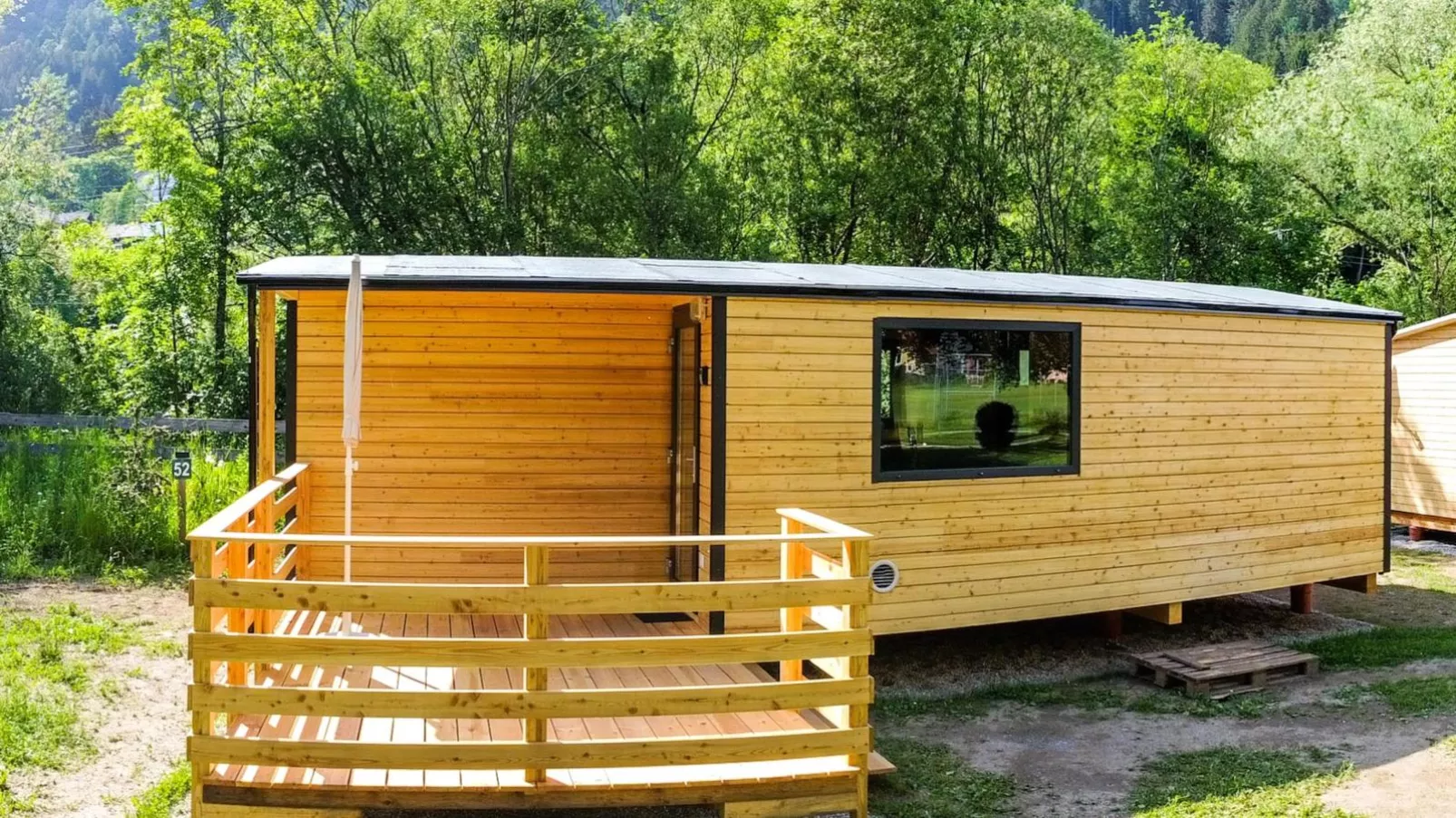 Wood Cube an der Drau-Buitenkant zomer