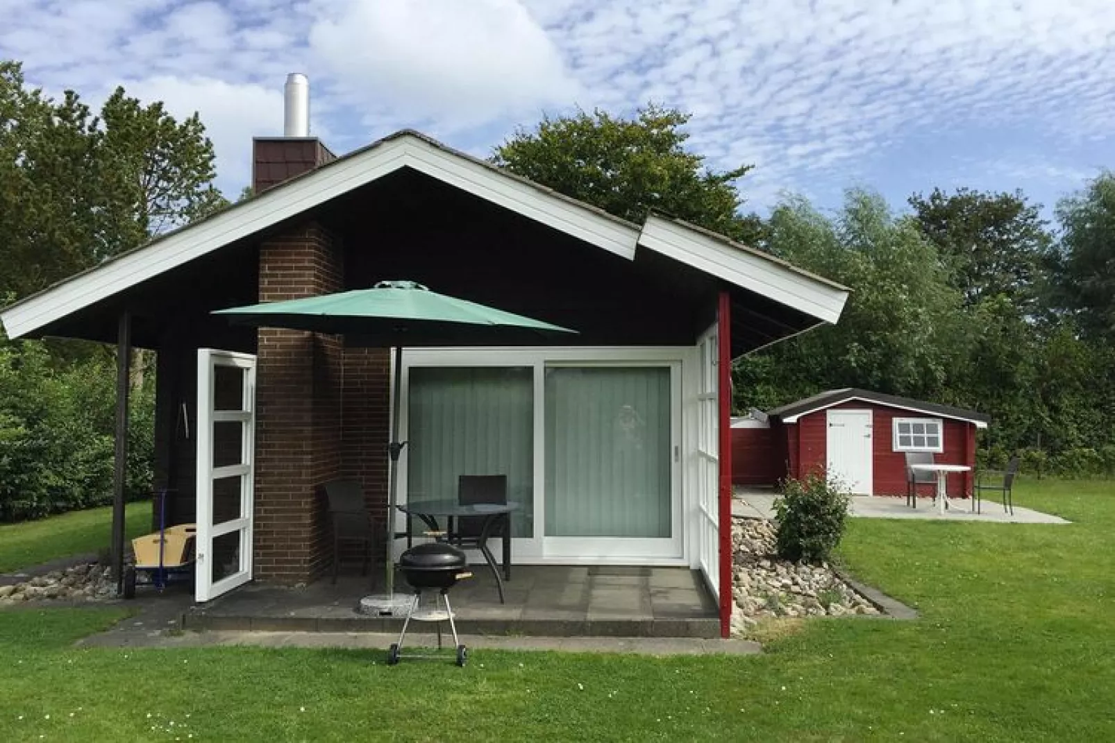 Blockhaus Damp-58 qm-Buitenkant zomer