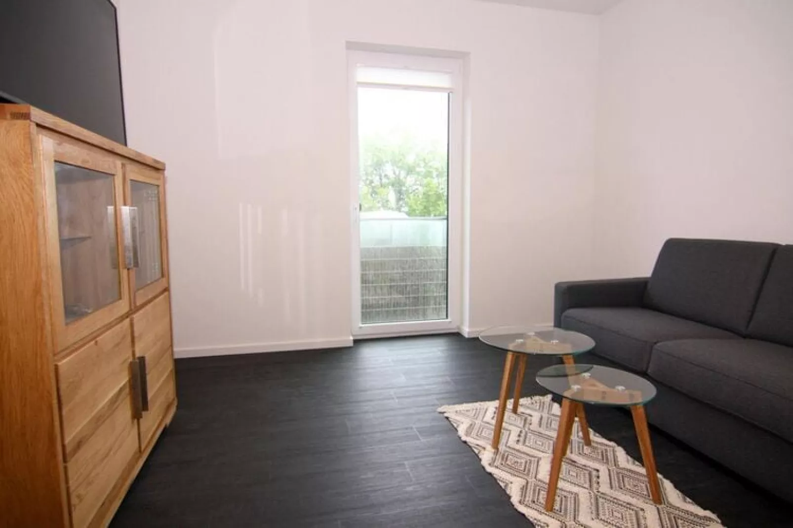 Wohnung 1 im 1 OG-Woonkamer