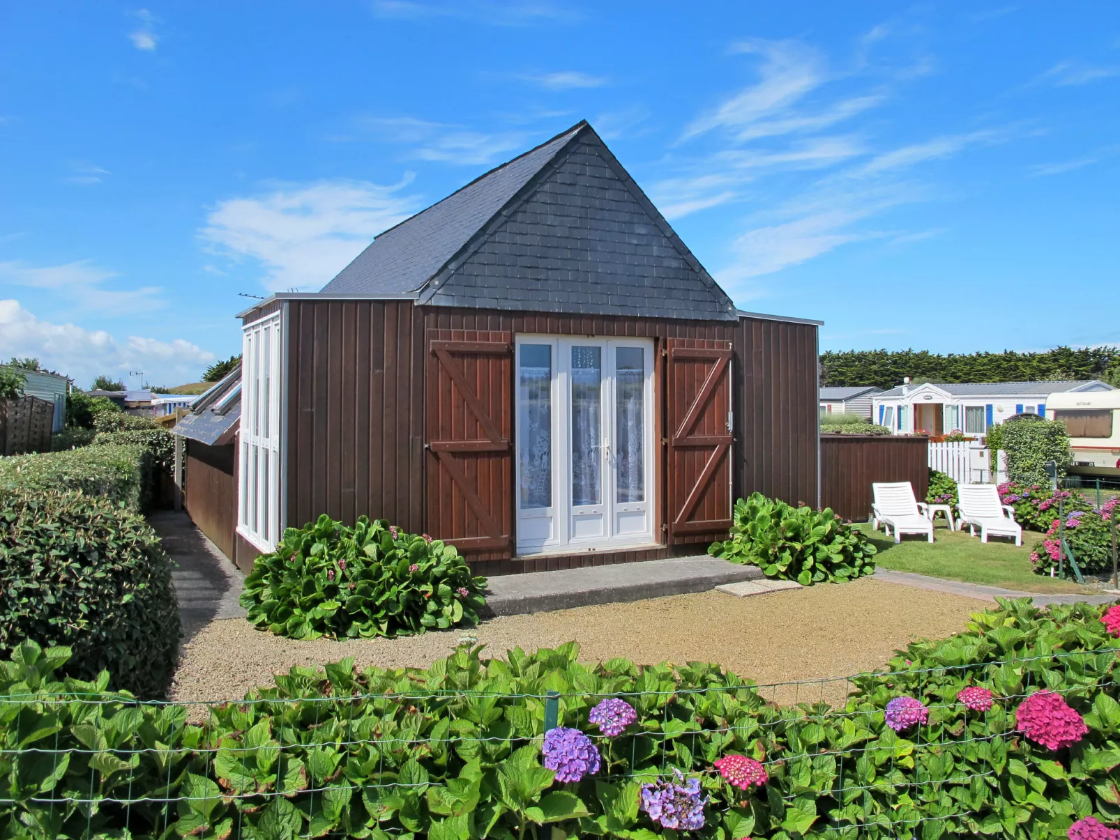 Petit Chalet à la Plage-Buiten