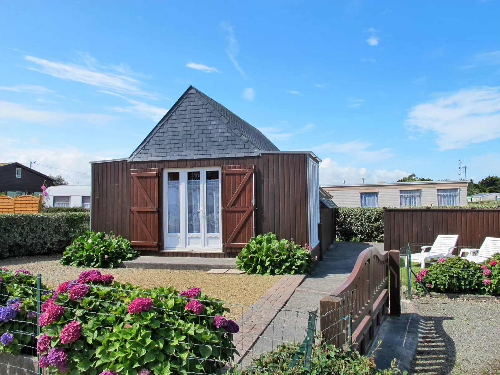 Petit Chalet à la Plage-Buiten