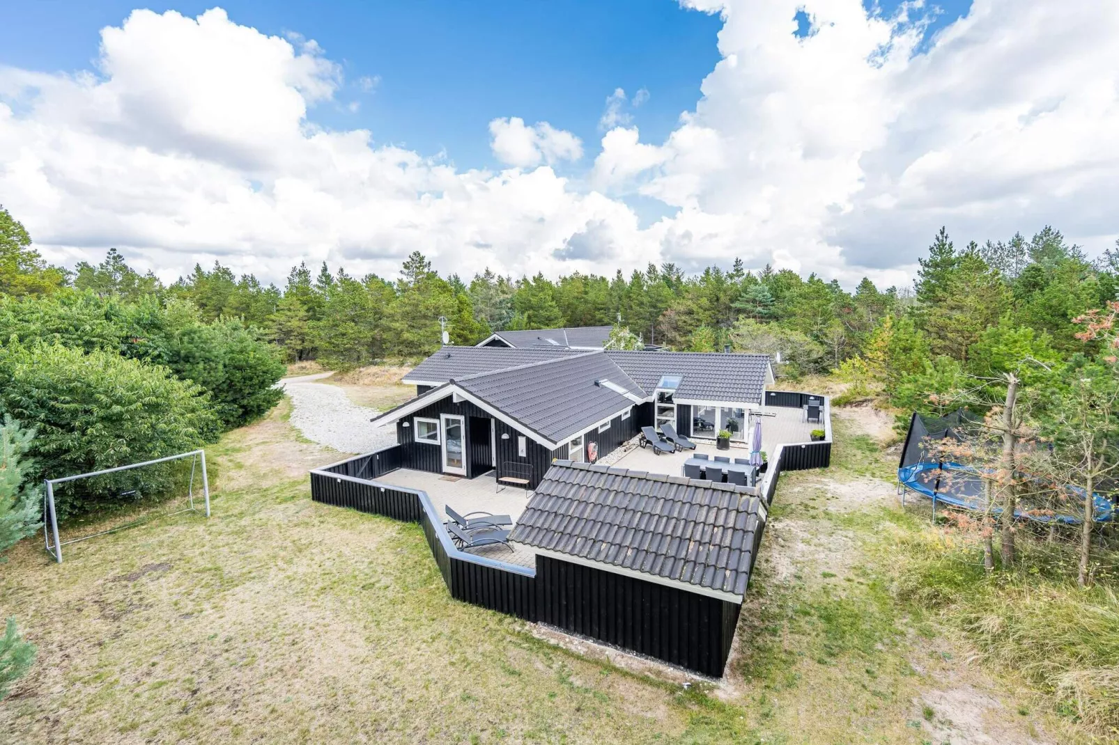 8 persoons vakantie huis op een vakantie park in Blåvand-Buitenlucht