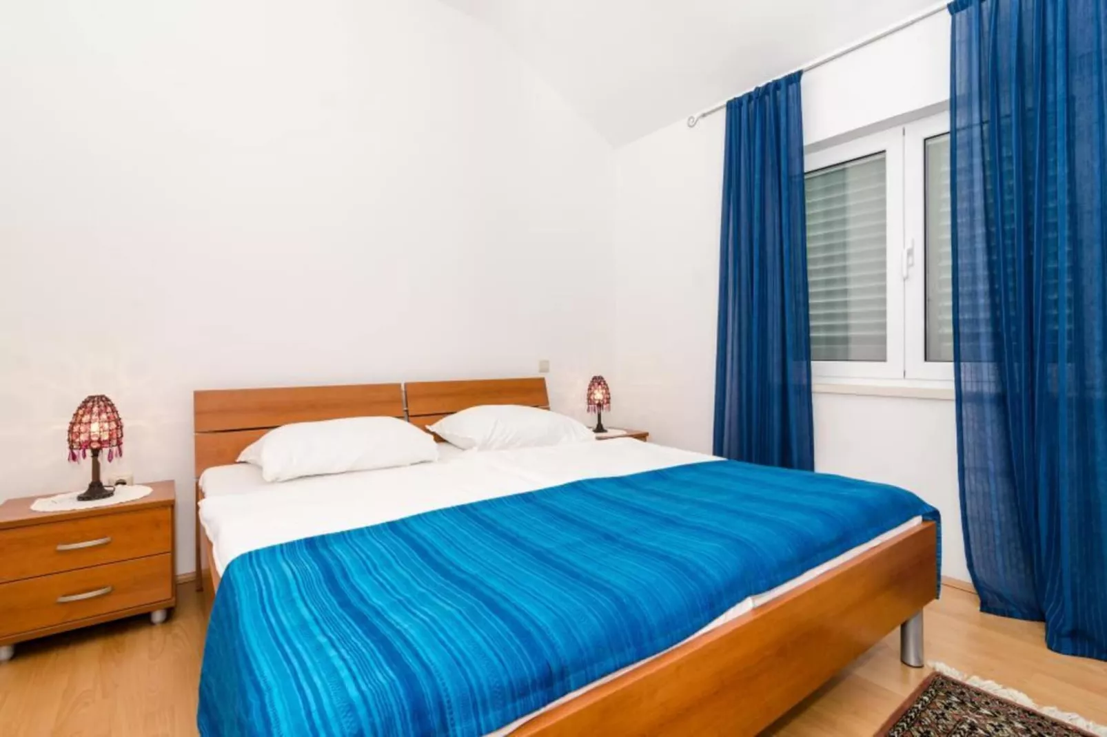 Apartments Peco - One Bedroom Apartment with Patio and Side Sea View-Slaapkamer