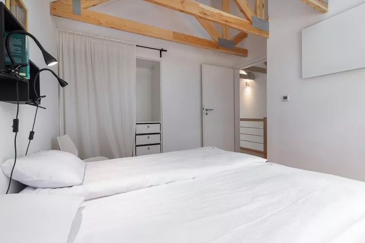 Domy wakacyjne dla 5 osób nad jeziorem Wisełka-Slaapkamer