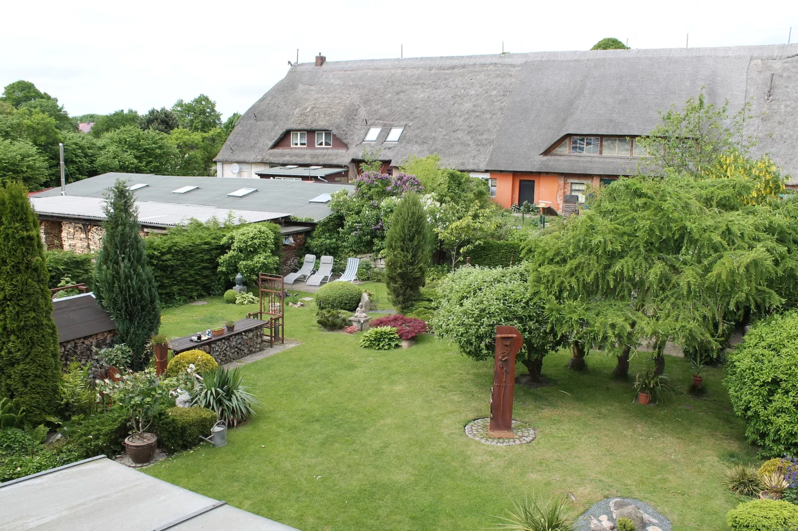 Strandnahe Ferienwohnung Betty mit großem Garten-Uitzicht zomer