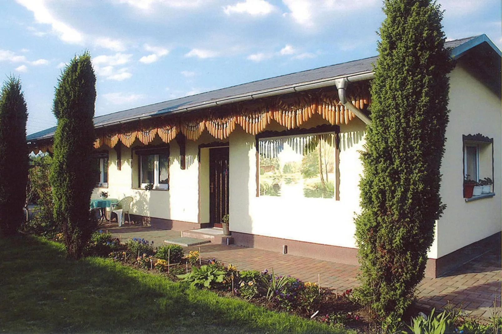 Reihenbungalow an einem Spreearm-Buitenkant zomer