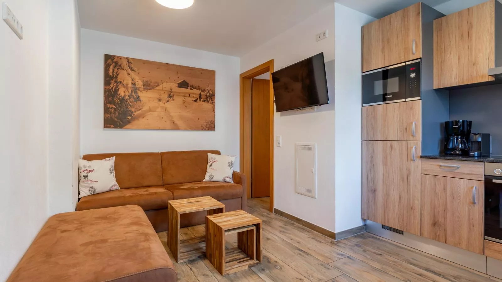 Tauern Suites Mitterwirt TOP 215-Woonkamer