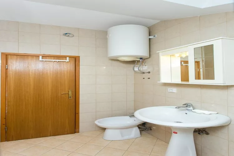 Apartments Villa Maslina - Two Bedroom Apartment with Terrace and Garden View-Slaapkamer