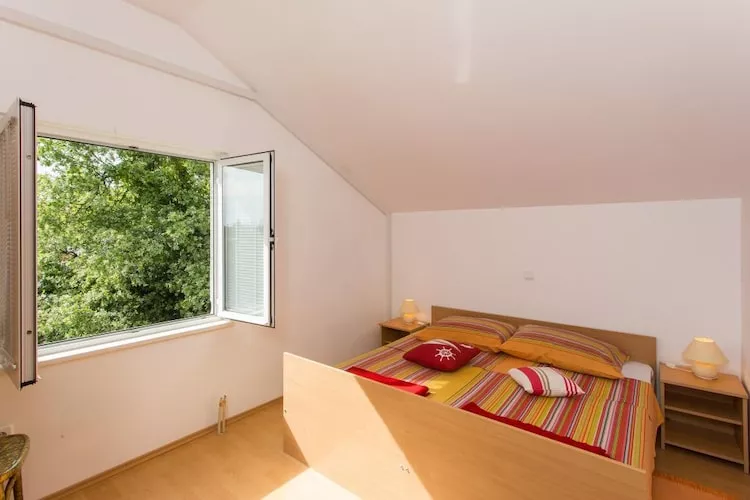 Apartments Villa Maslina - Two Bedroom Apartment with Terrace and Garden View-Slaapkamer