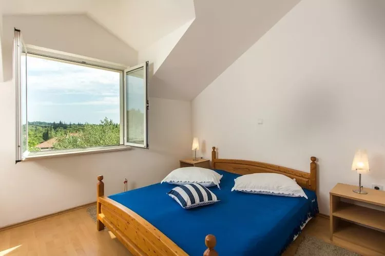Apartments Villa Maslina - Two Bedroom Apartment with Terrace and Garden View-Slaapkamer