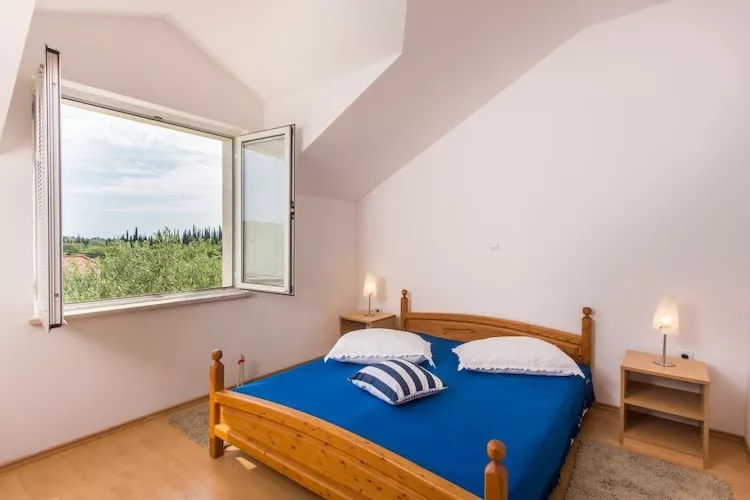 Apartments Villa Maslina - Two Bedroom Apartment with Terrace and Garden View-Slaapkamer