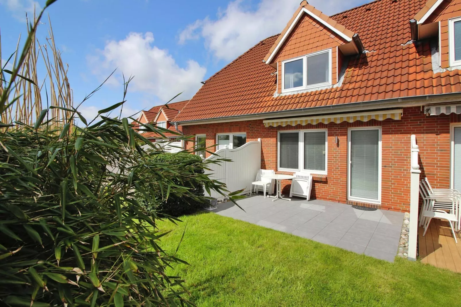 Reihenhaus Strandglück-Buitenkant zomer