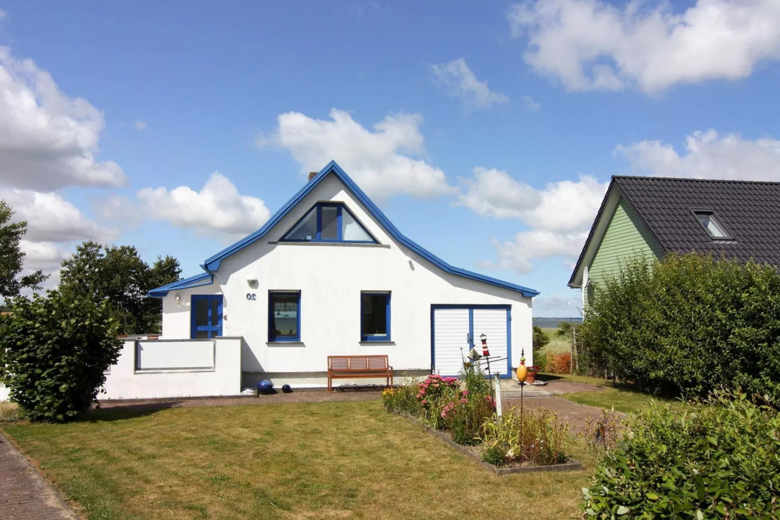 Ferienhaus Am Schilfufer-Buitenkant zomer