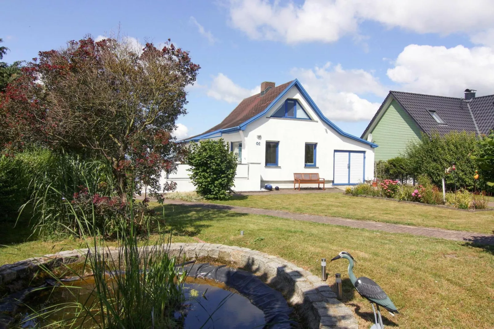 Ferienhaus Am Schilfufer-Buitenkant zomer