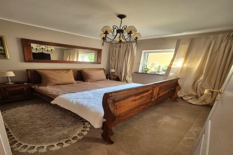Dom wakacyjny z sauną i jacuzzi dla 2 osób Lubin-Slaapkamer