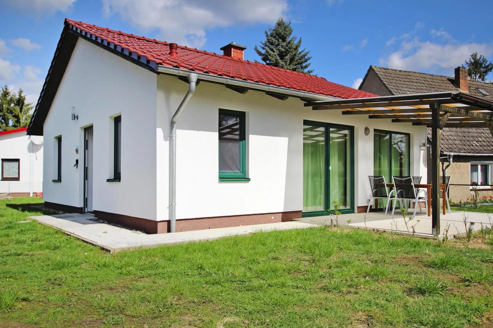 Ferienhaus Seeadler 62 qm-Buitenkant zomer