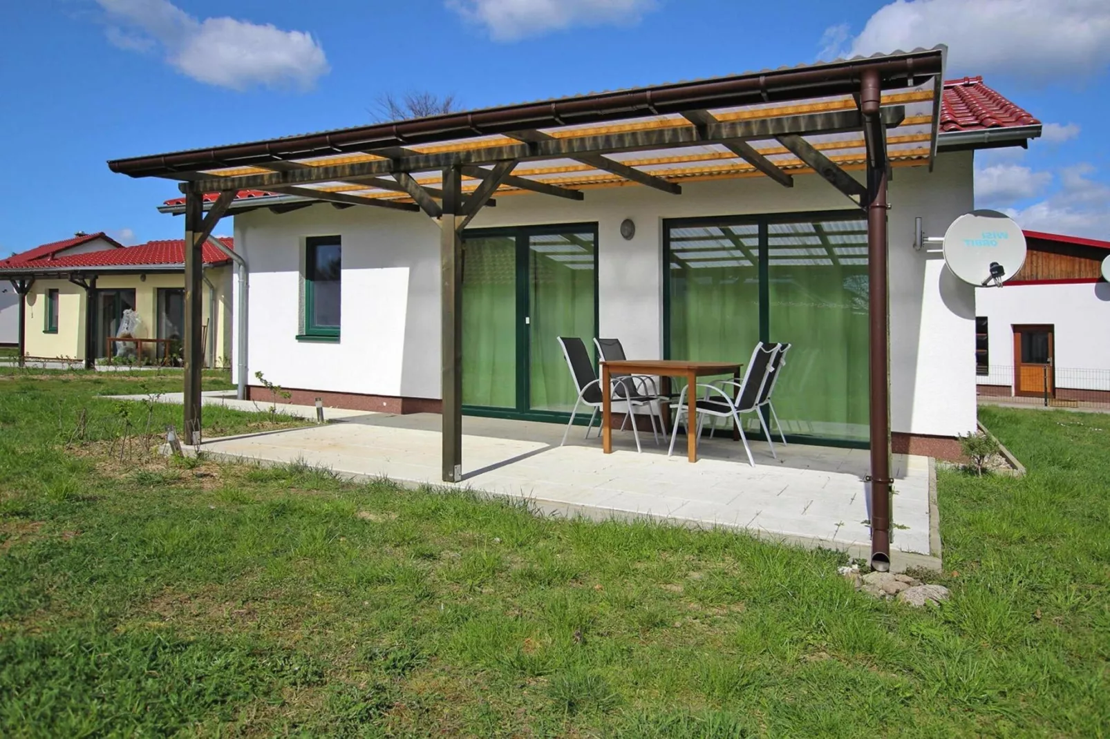 Ferienhaus Seeadler 62 qm-Buitenkant zomer