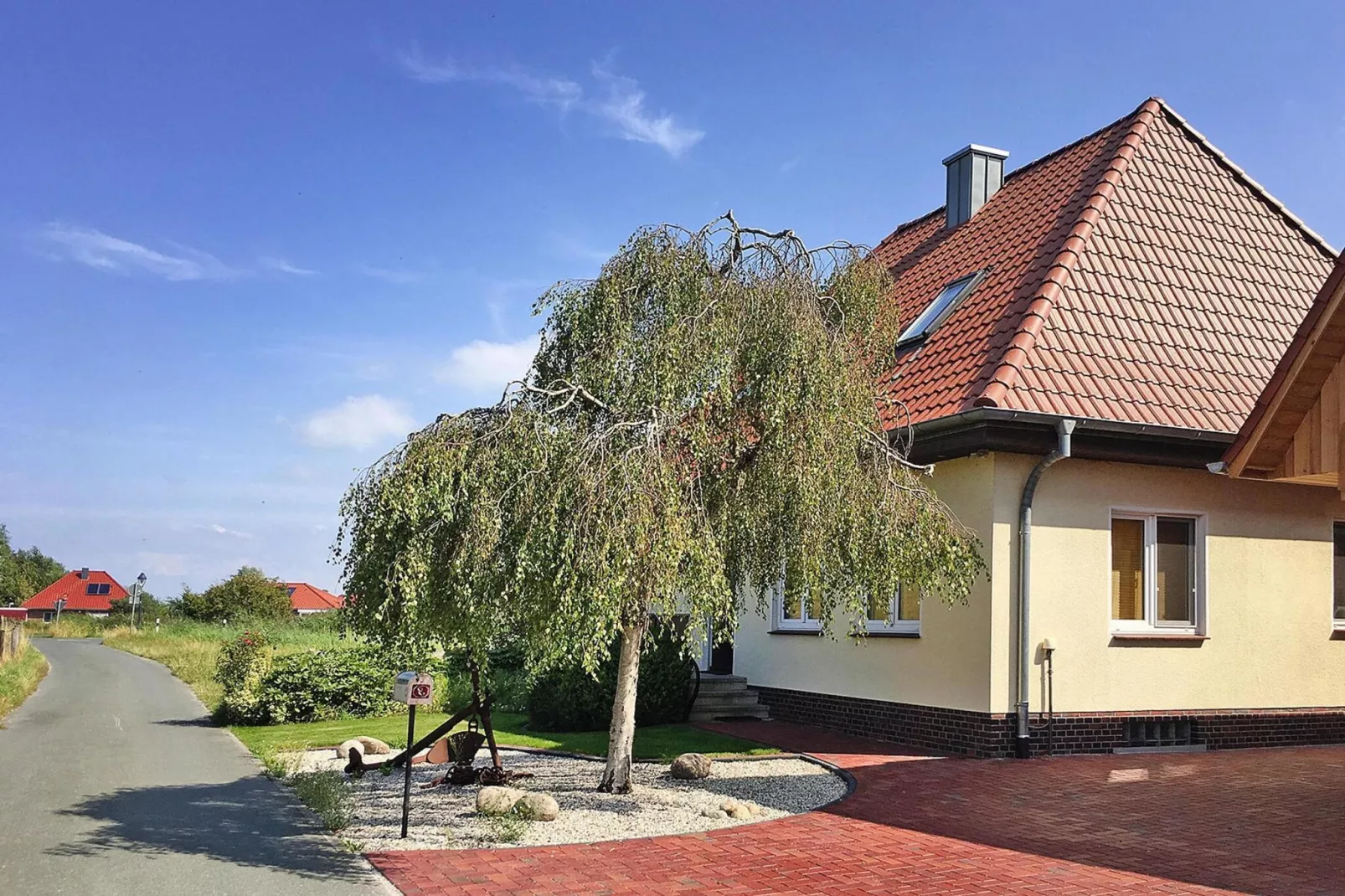 Krabbenfischerhaus Fedderwardersiel-Buitenkant zomer