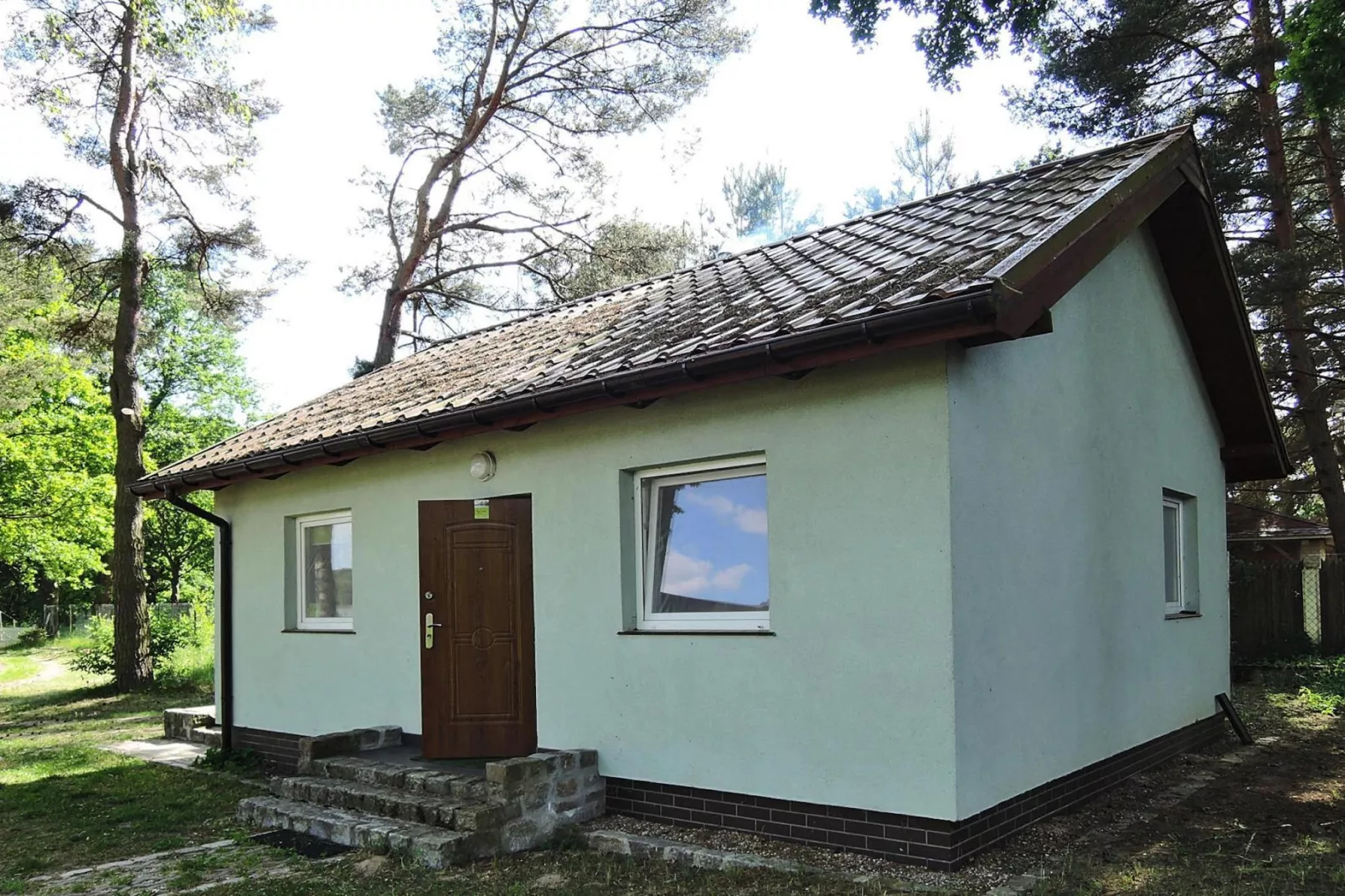 Holiday complex in Jezierzyce by Szczecin at the lake for 4 persons 30 qm Typ B Zielony-Buitenkant zomer