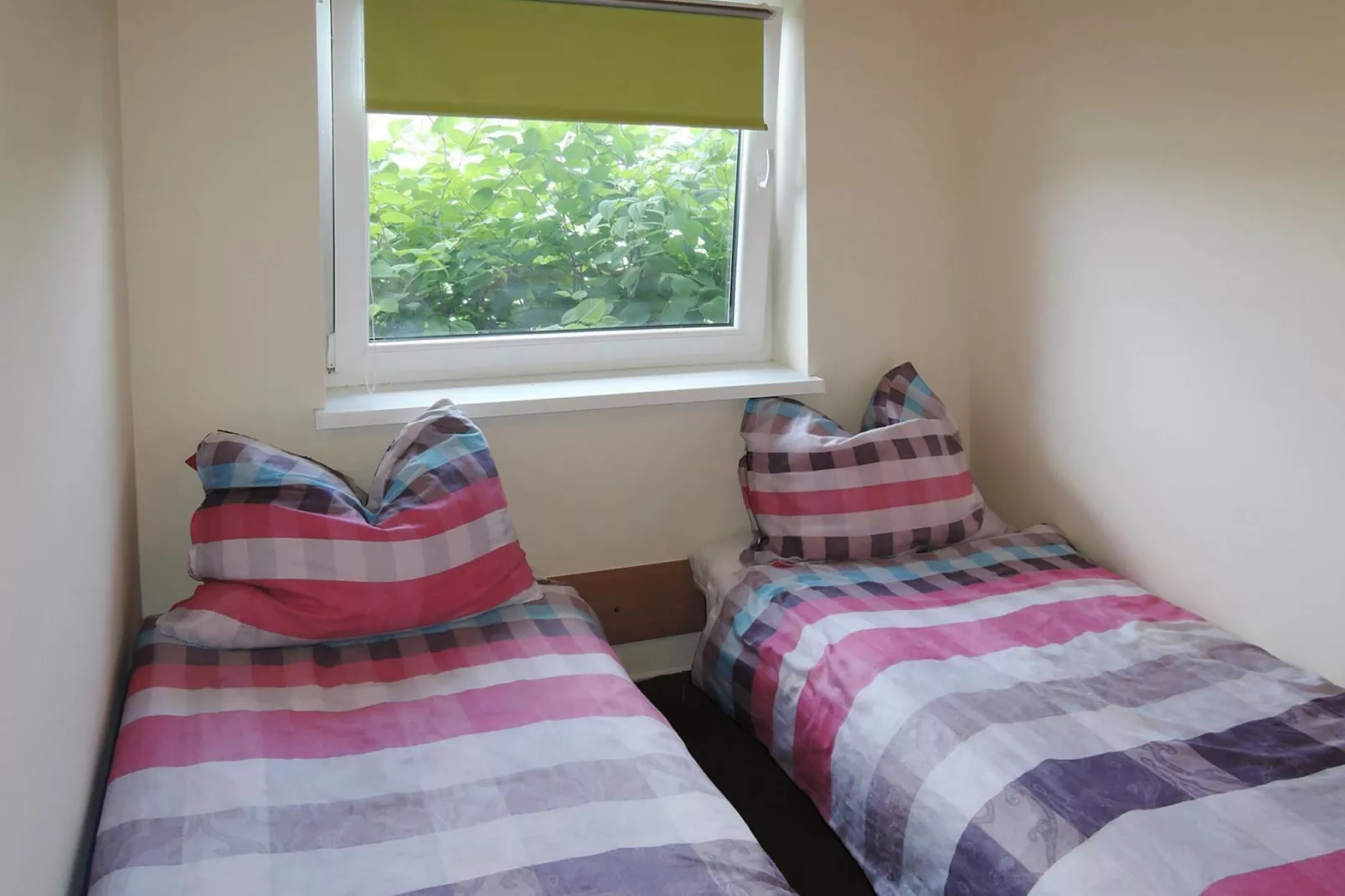 Holiday complex in Jezierzyce by Szczecin at the lake for 4 persons 30 qm Typ B Zielony-Slaapkamer