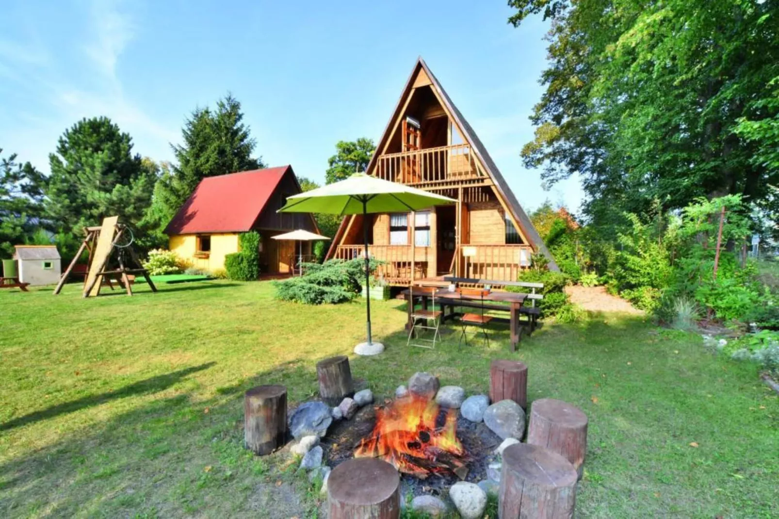 Domek letniskowy 70 m2 TYP B Osieki-Buitenkant zomer