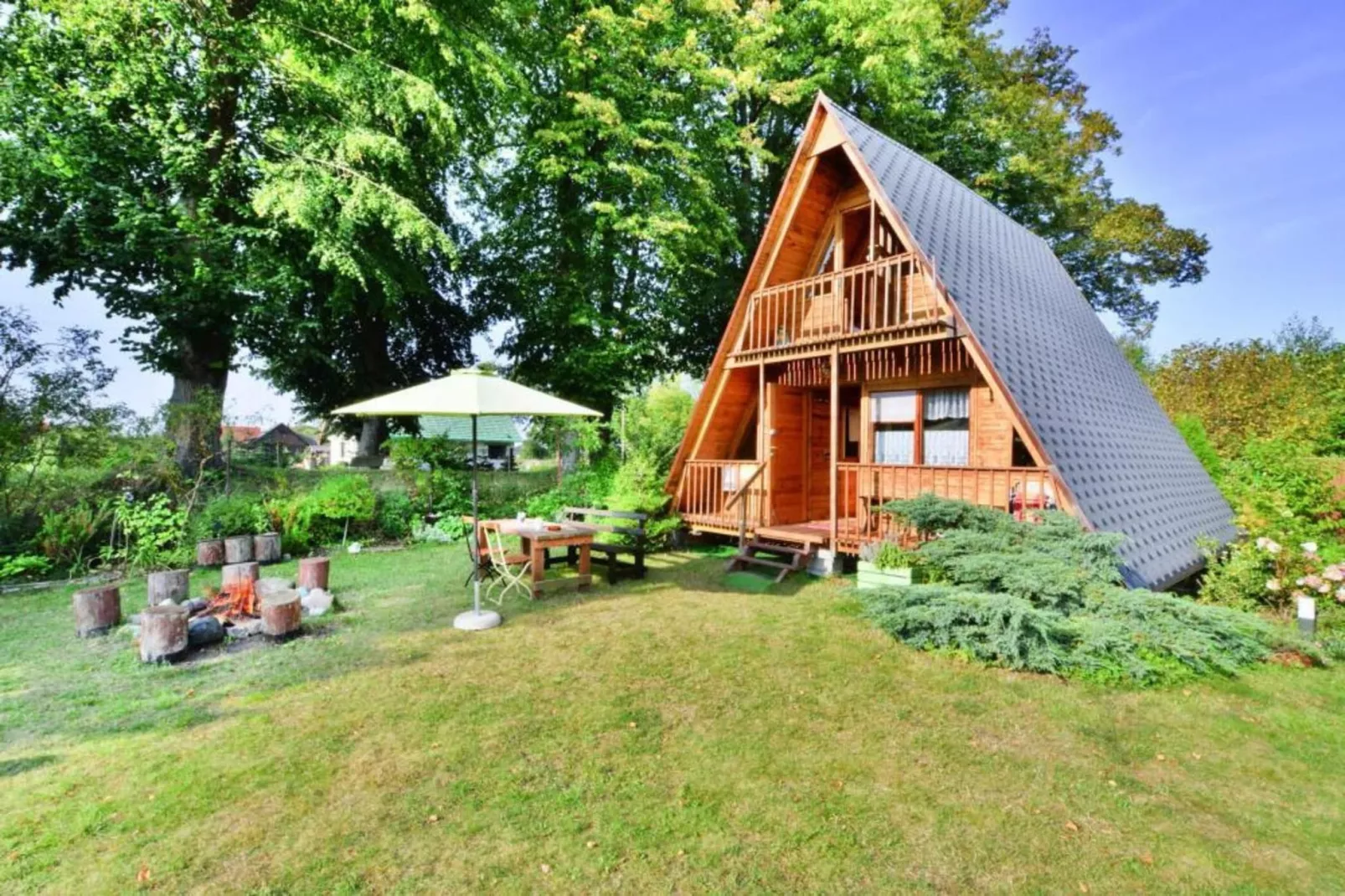 Domek letniskowy 70 m2 TYP B Osieki-Buitenkant zomer