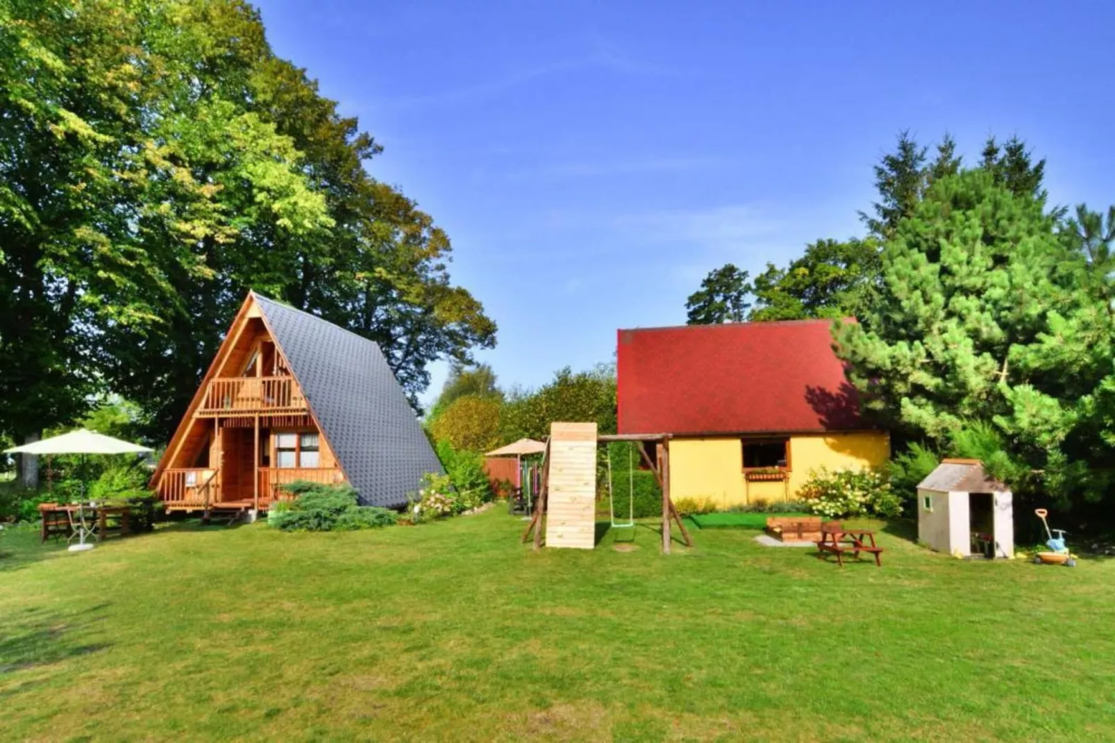 Domek letniskowy 70 m2 TYP B Osieki-Buitenkant zomer