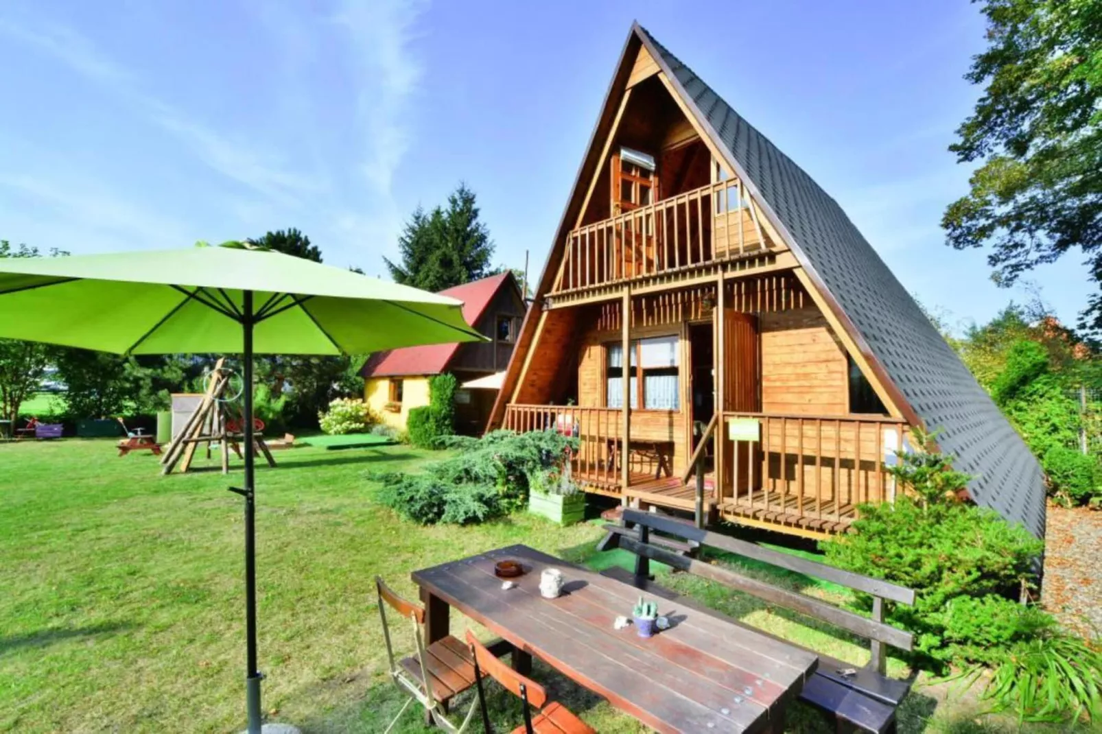 Domek letniskowy 70 m2 TYP B Osieki-Buitenkant zomer