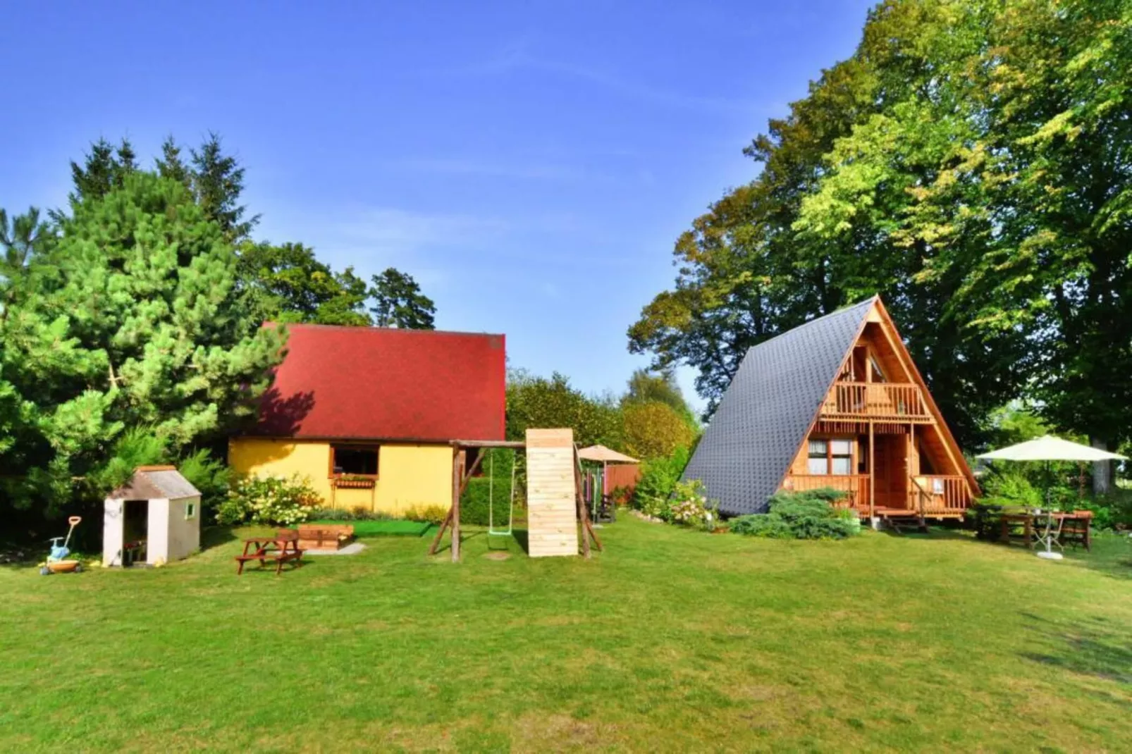 Domek letniskowy 70 m2 TYP B Osieki-Buitenkant zomer