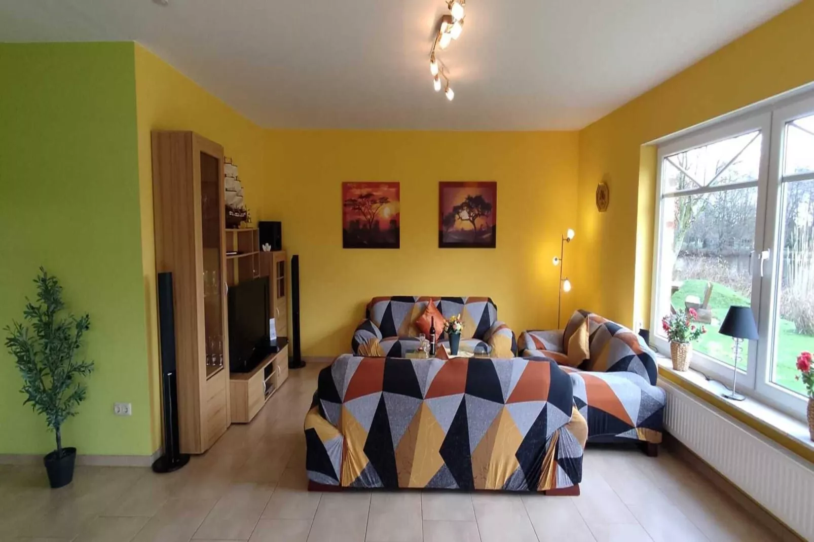 Große Ferienwohnung für 6 Personen mit Terrasse-Woonkamer