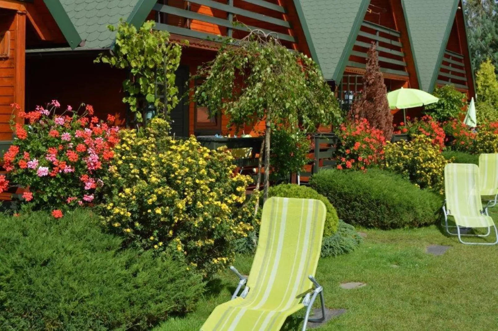 Domki letniskowe dla 4 osób Sarbinowo-Tuinen zomer