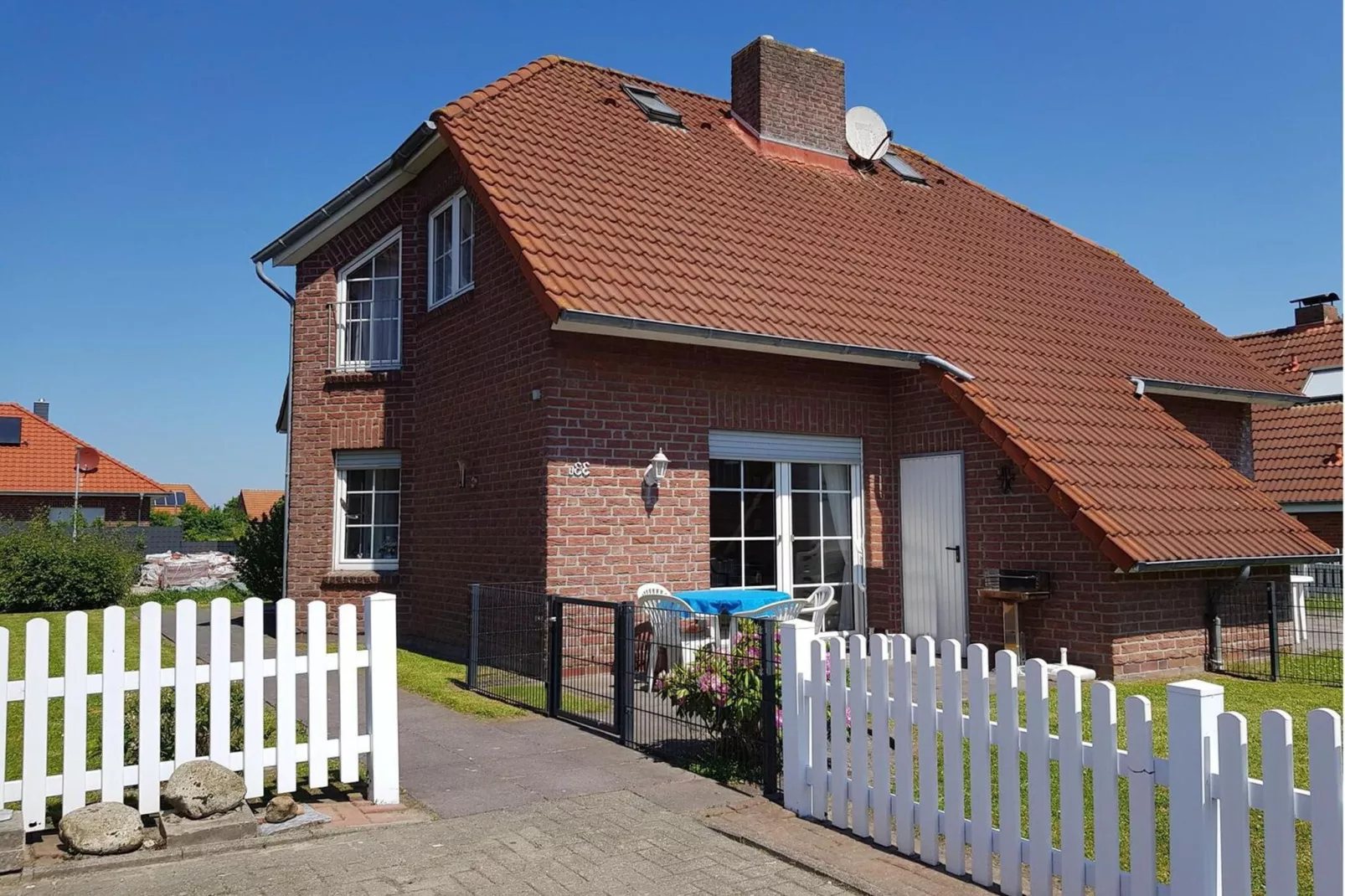 Doppelhaushälfte Friesenglück Neßmersiel-Buitenkant zomer
