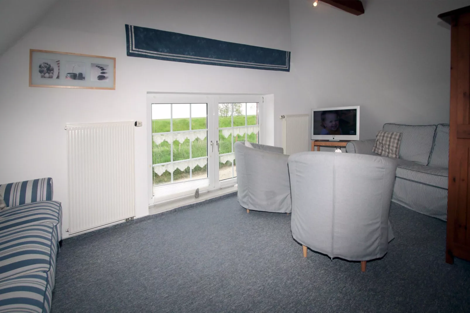 Ferienwohnung in Hilgenriedersiel-Woonkamer