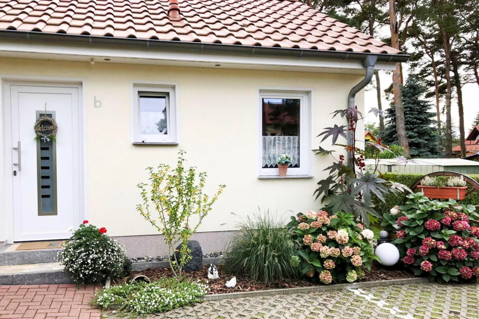 Doppelhaushälfte rechts-Tuinen zomer