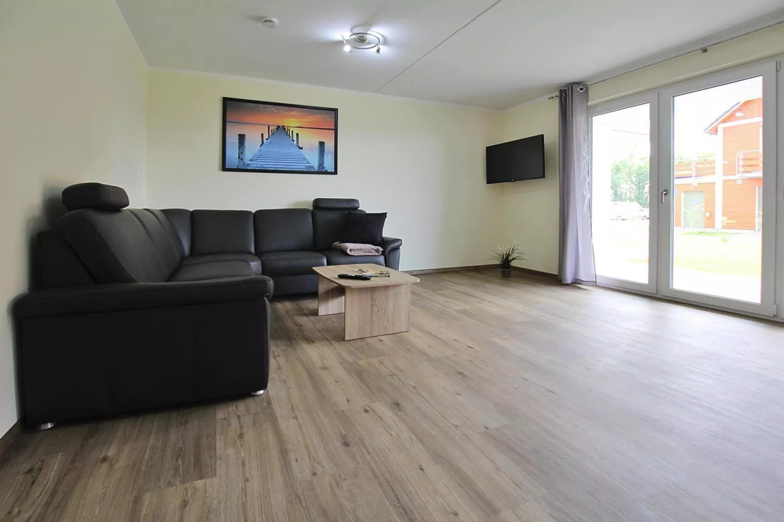 Apartment Hafenflair / Haus 3 EG-Wohnung 9 2 und 2 Personen-Woonkamer