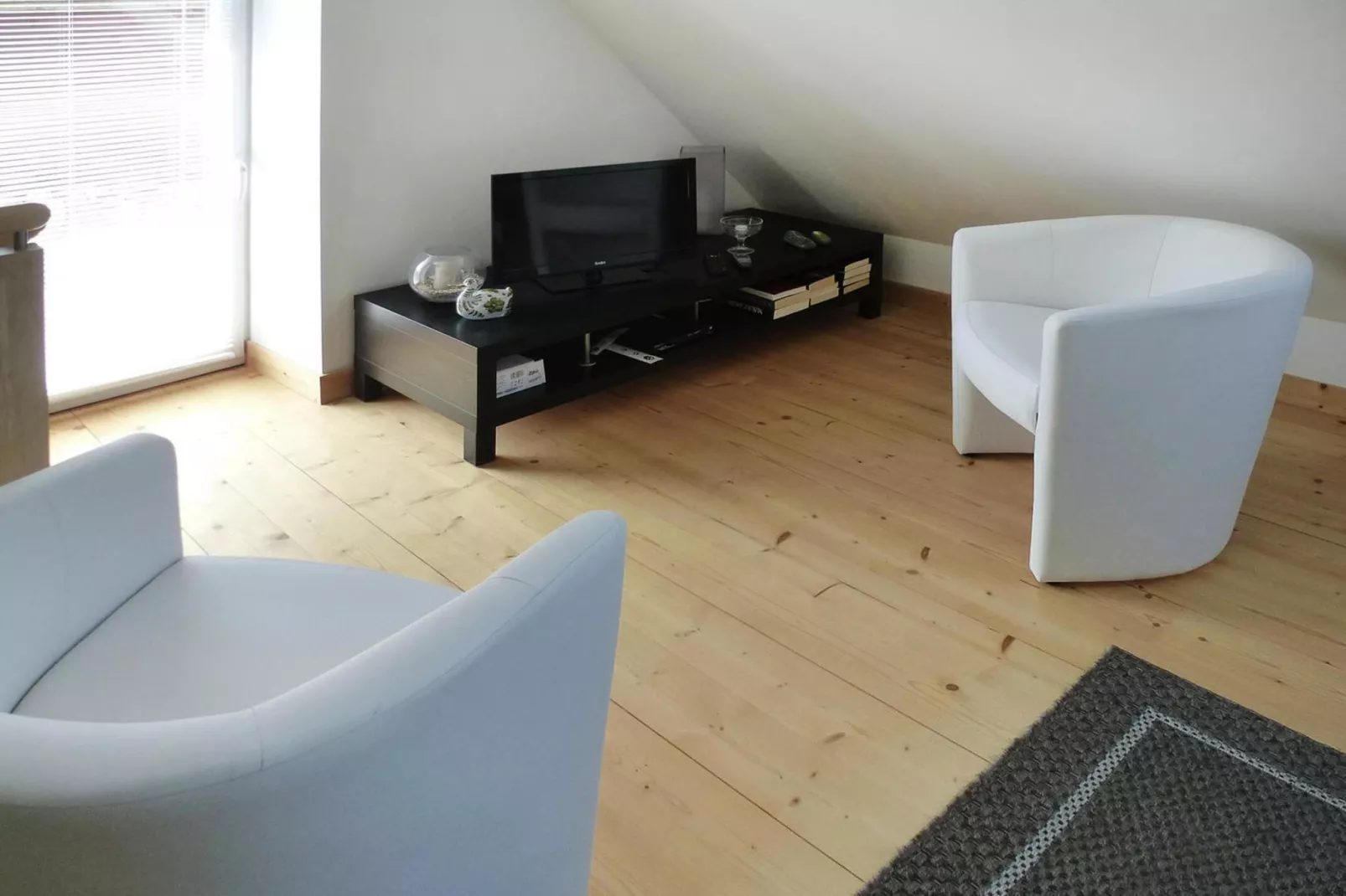 Natural stone cottage with garden and sea view on Breton estate Plougasnou-Woonkamer