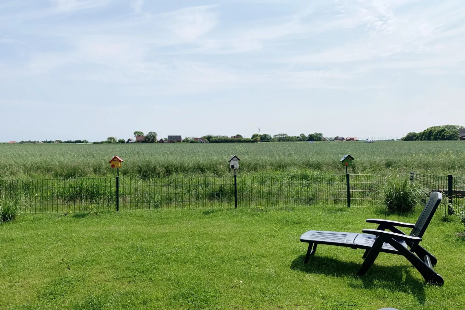 Gemütliche Nordsee-Wohnung in Neßmersiel mit Garten und Feldblick-Uitzicht