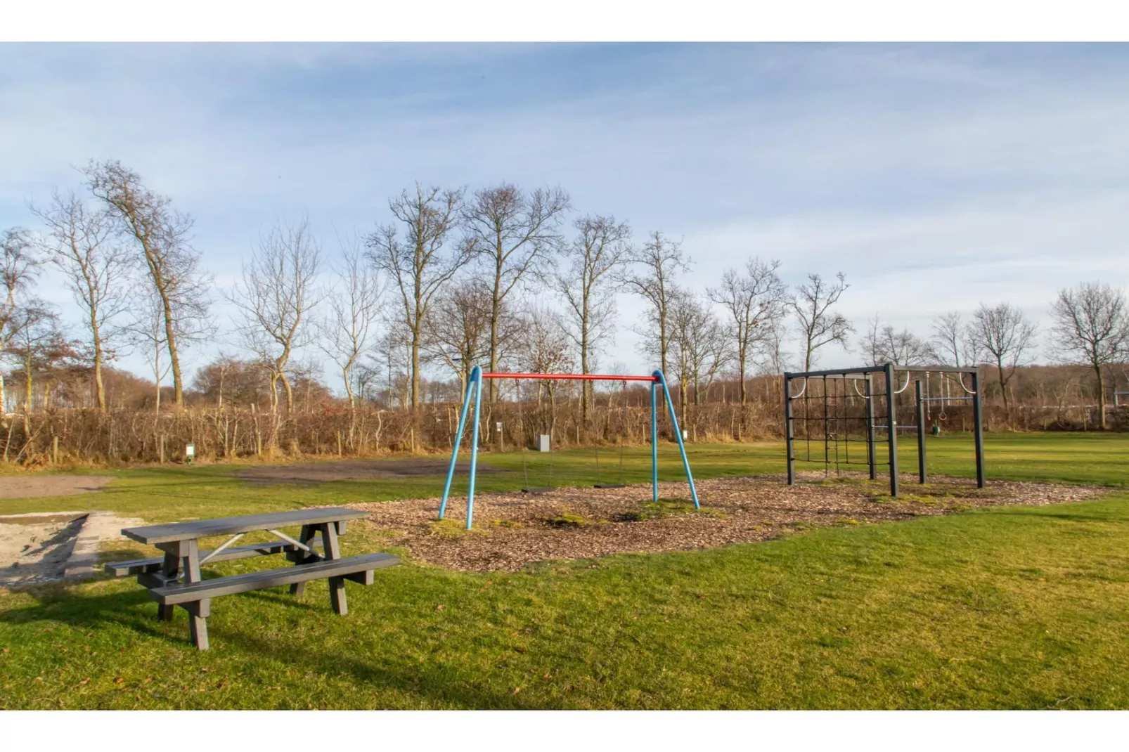 Chalet - Camping de Duinhoeve 'Bosdier'-Buitenkant zomer