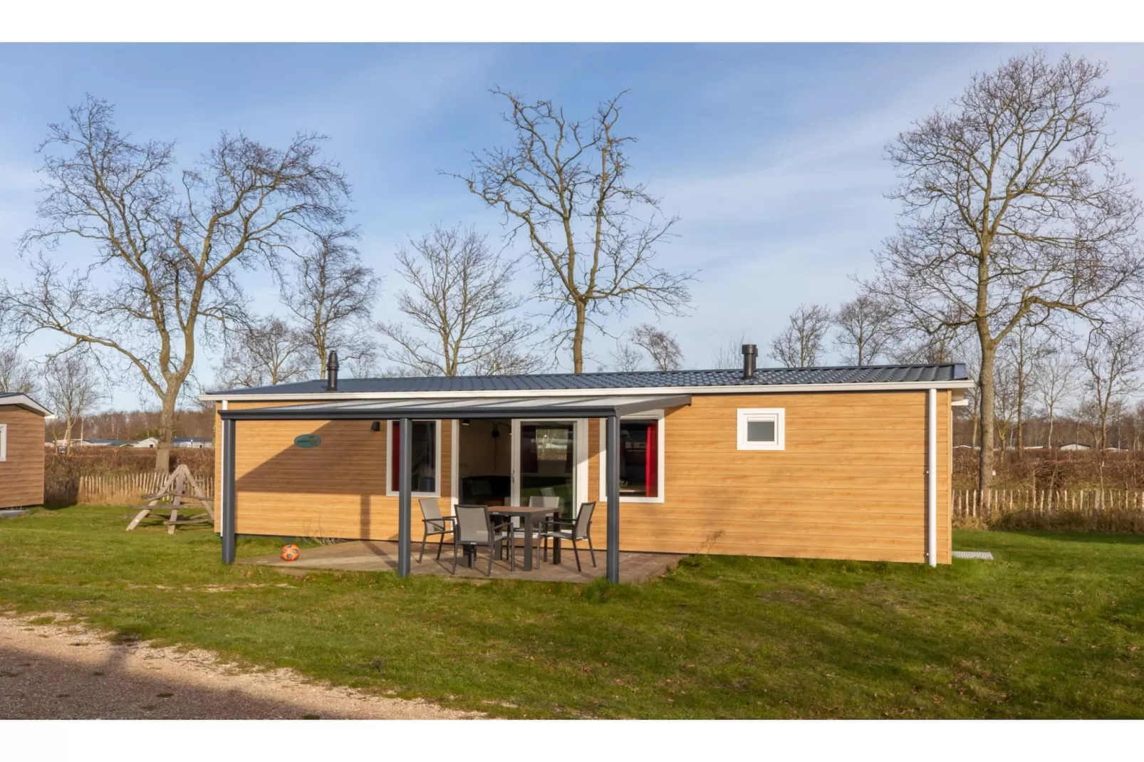 Chalet - Camping de Duinhoeve 'Bosdier'-Buitenkant zomer