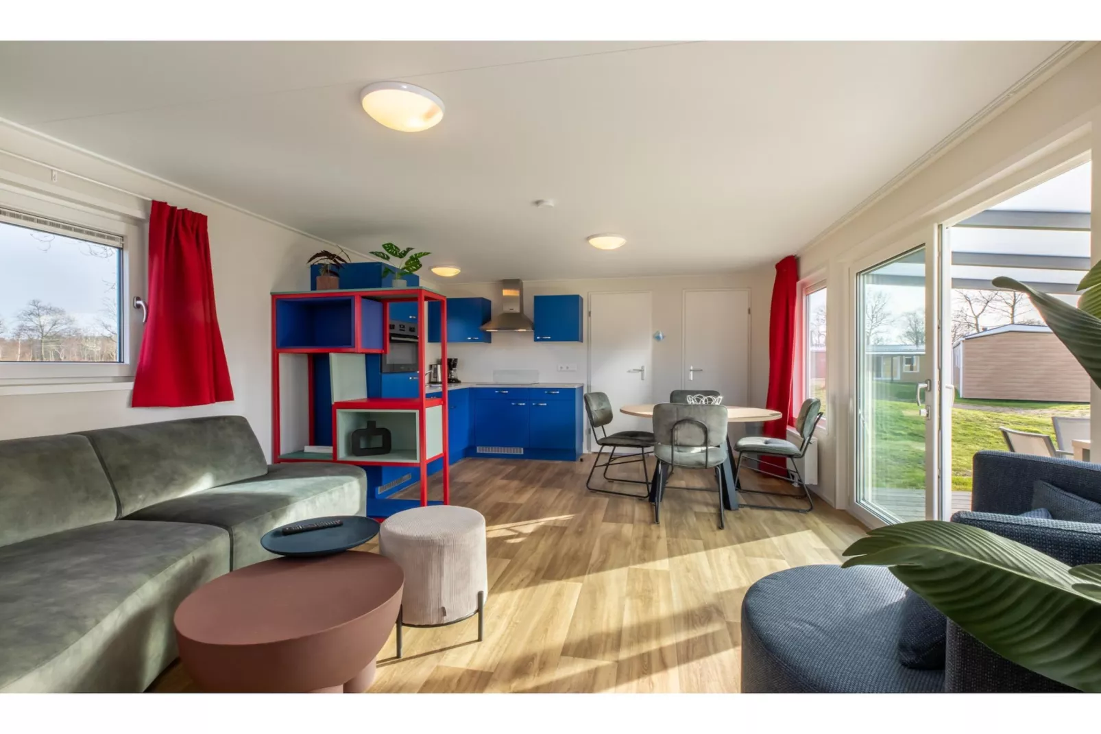 Chalet - Camping de Duinhoeve 'Bosdier'-Woonkamer