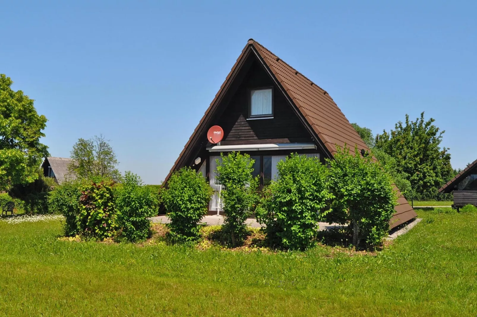 Holiday village Vorauf, Siegsdorf-Typ B, Ferienhaus Typ Oslo, 81 qm-Buitenkant zomer