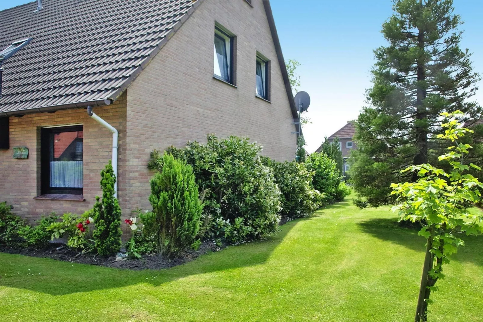 Reihenhaus Neßmersiel-Buitenkant zomer