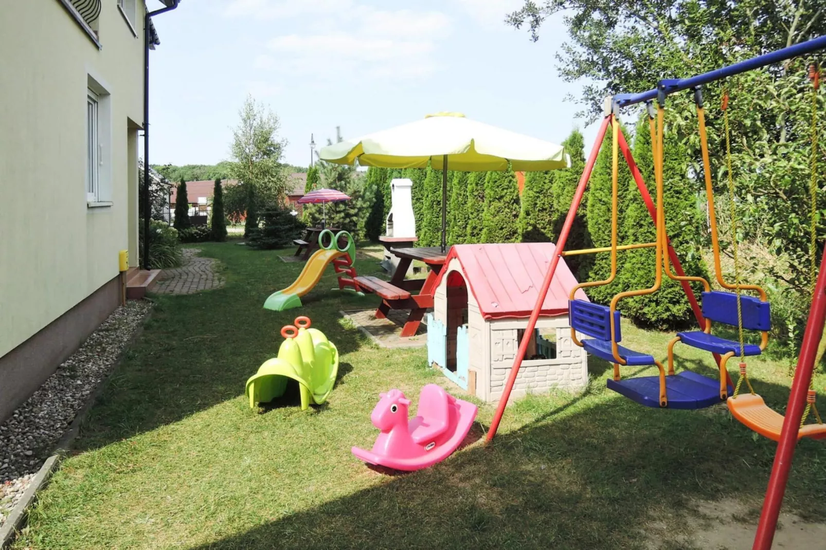 Holiday luxury apartment in Rewal-Tuinen zomer