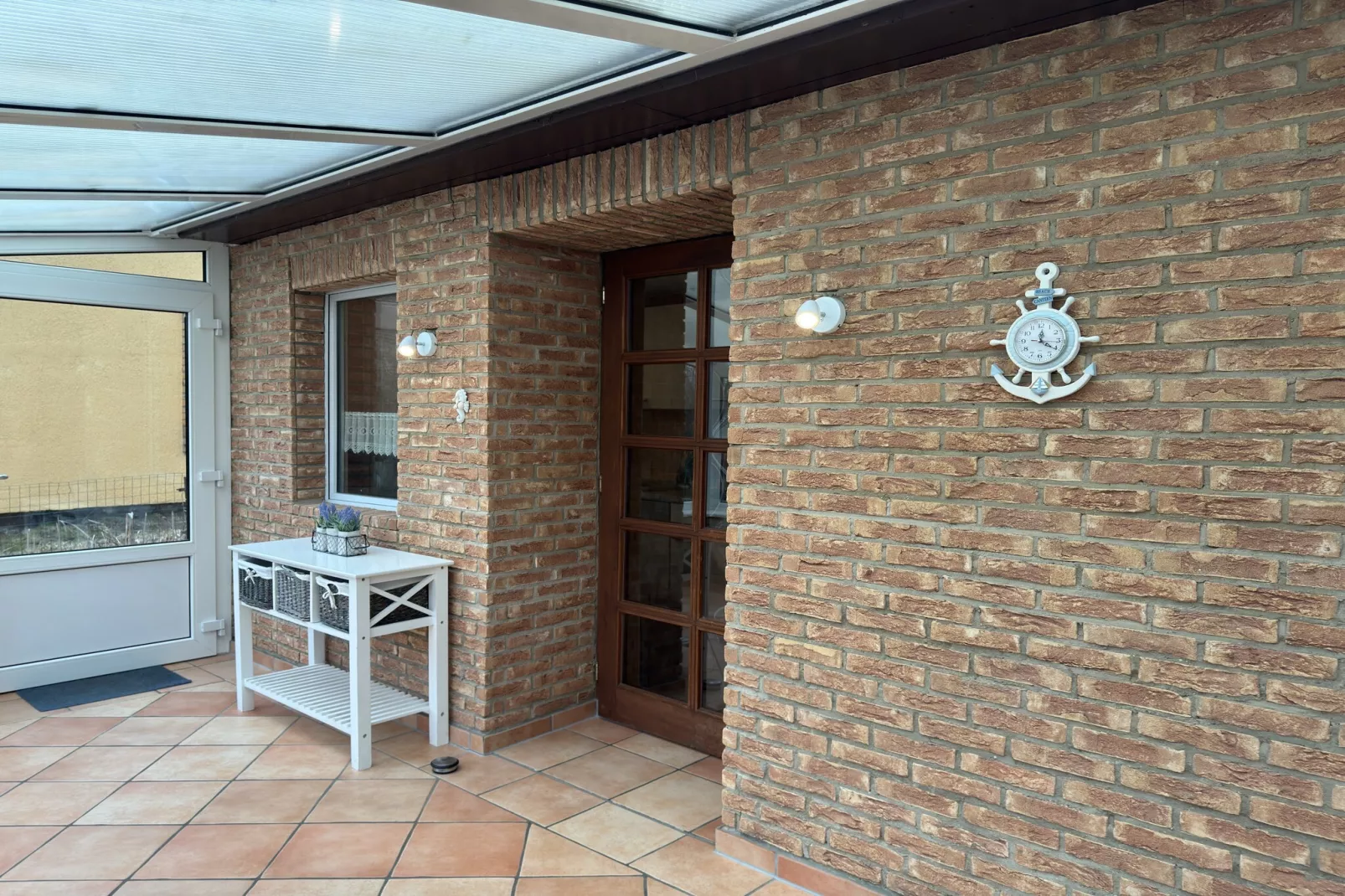 Ferienhaus mit Wintergarten-Buitenkant zomer