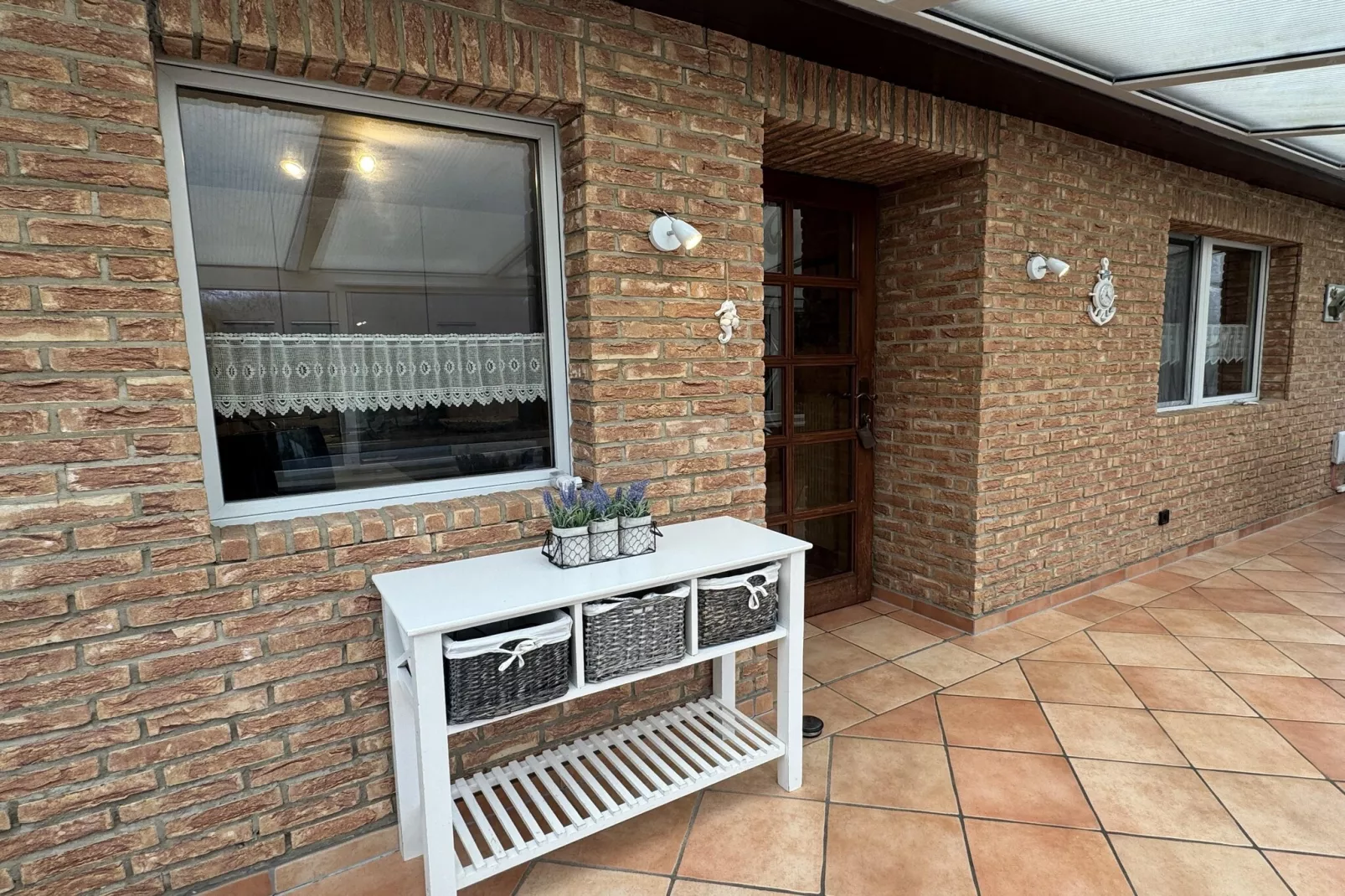 Ferienhaus mit Wintergarten-Buitenkant zomer