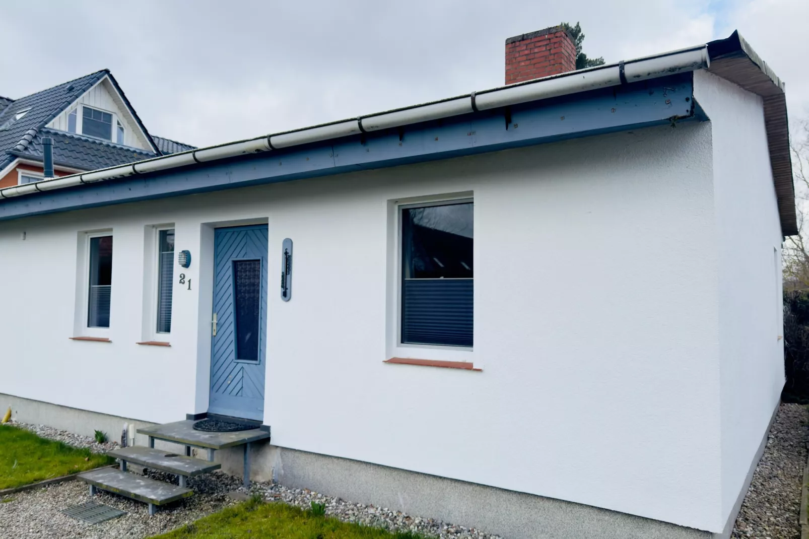 Das DarßHaus mit Kamin und Garten-Exterieur winter