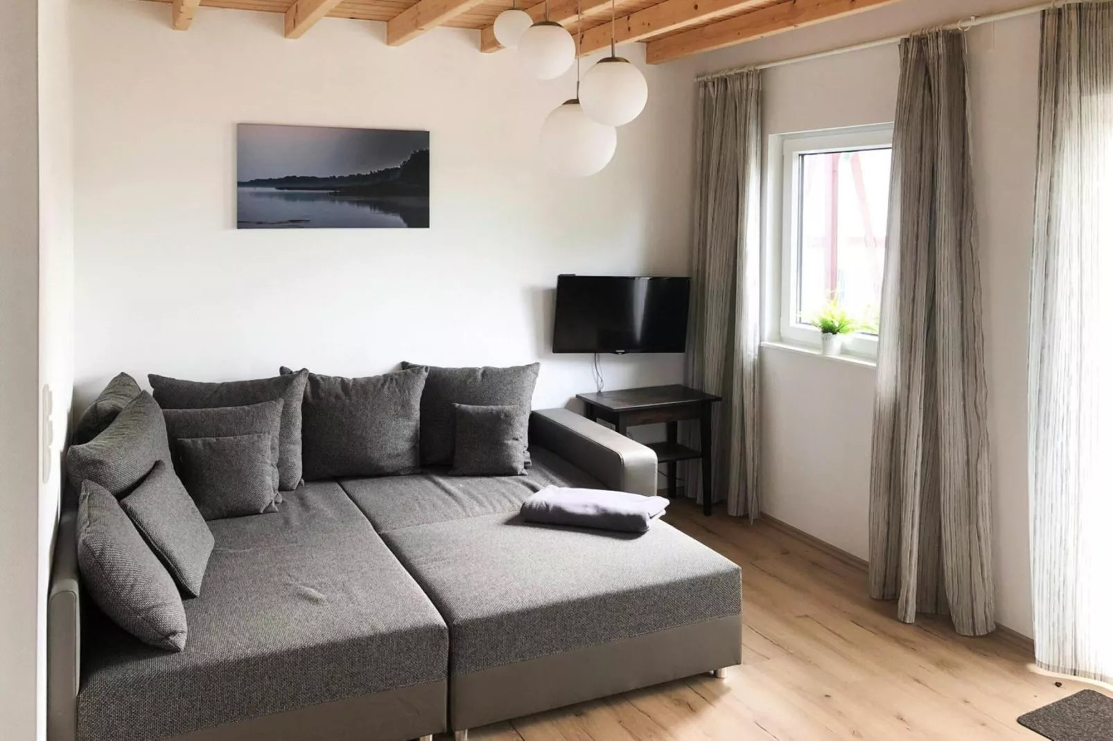 Bungalow am Partwitzer See-Woonkamer